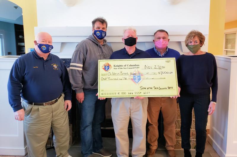 Children’s Beach House check presentation attendees shown are (l-r) Paul King, Knights donations chair; Jim Hendrick, Knights life programs chair; Grand Knight Richard Duffy; Richard Garrett, Children’s Beach House executive director; and Patrice Tosi, Children’s Beach House vice president of advancement. SUBMITTED PHOTO